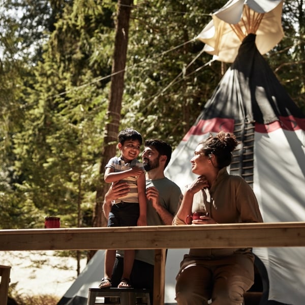 A young family enjoying a stay at the Fraser Canyon Teepee Escape and Great River Fishing Adventures