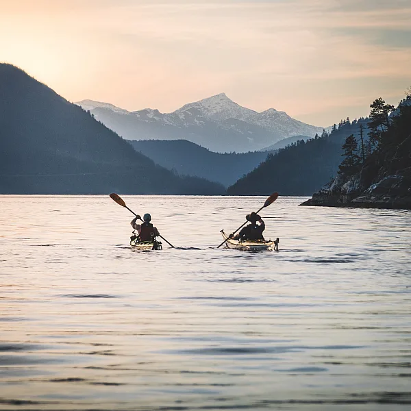 People kayaking on a lake
