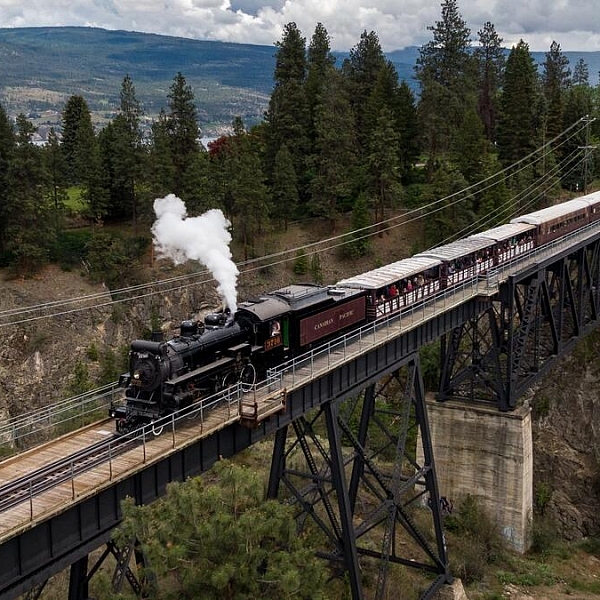 Kettle Valley Steam Railway in Summerland. Train travelling over Trout Creek Trestle Bridge.
