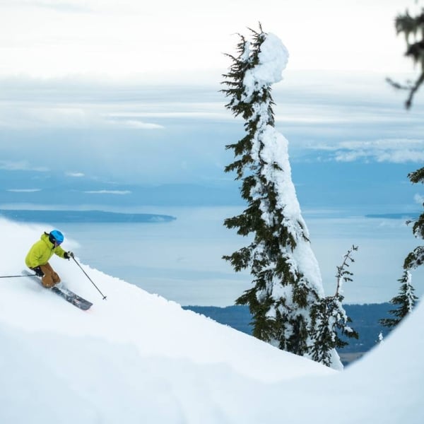 Skiing at Mount Washington Alpine Resort with views to the ocean
