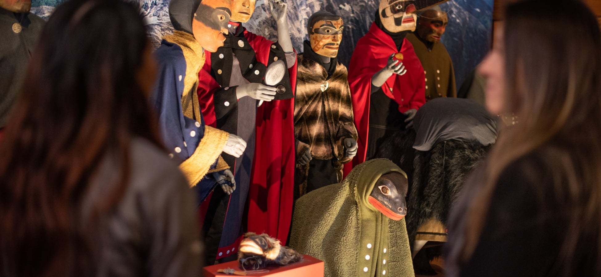 Visitors view ceremonial objects and cultural treasures of the Nisga'a Nation at the