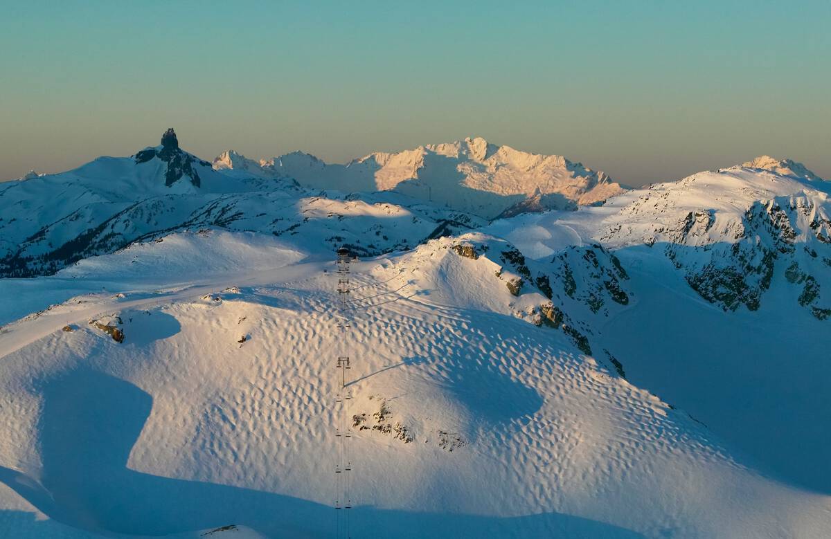 Aerial view at dusk of the Harmony Chair Lift with views of Black Tusk at Whistler Blackcomb Ski Resort.
