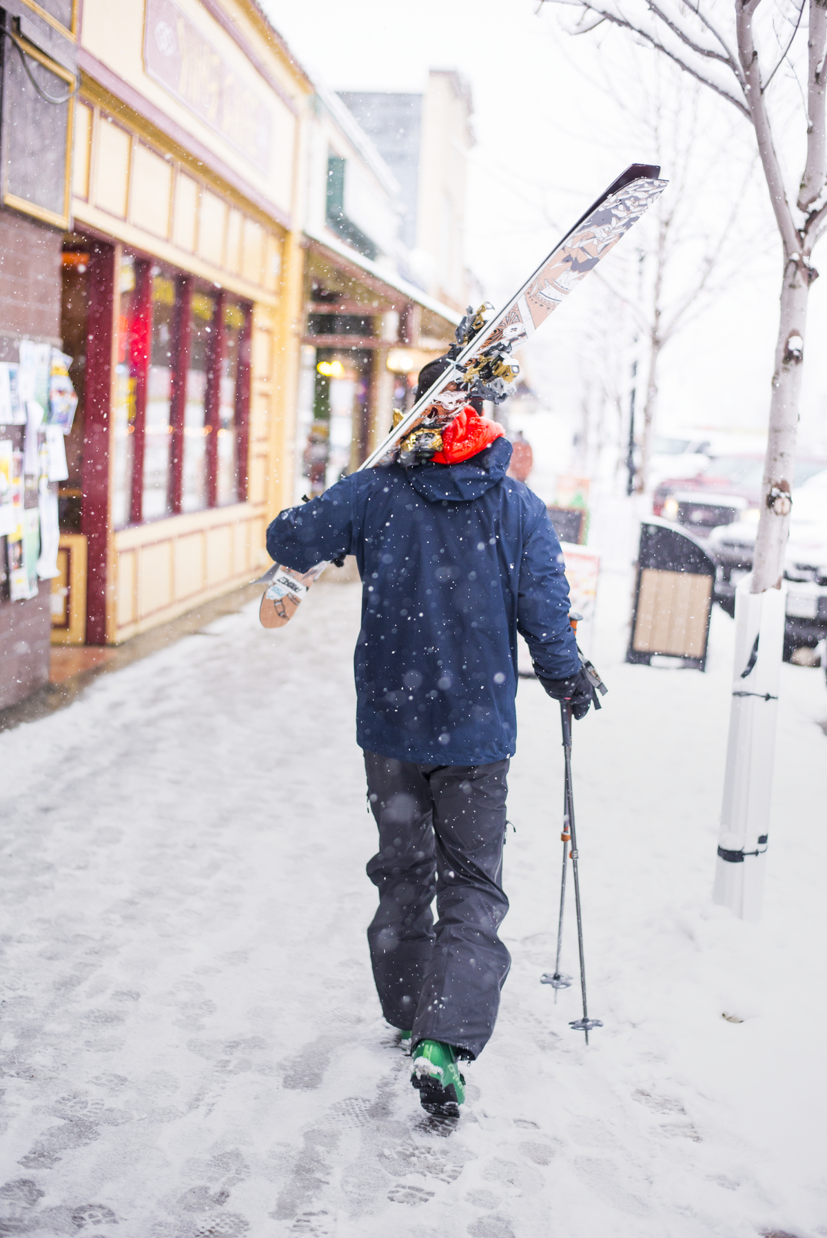 A skiier walking in downtown Rossland | Steve Ogle