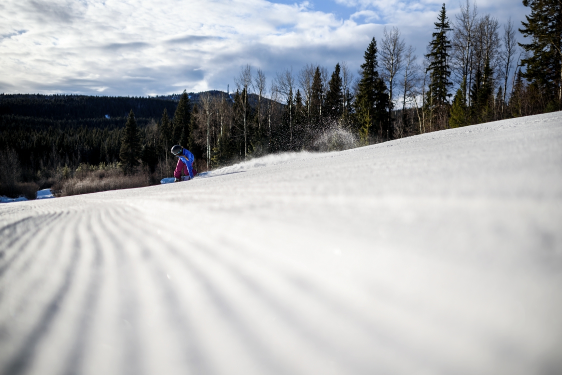 People skiing down tabor mountain
