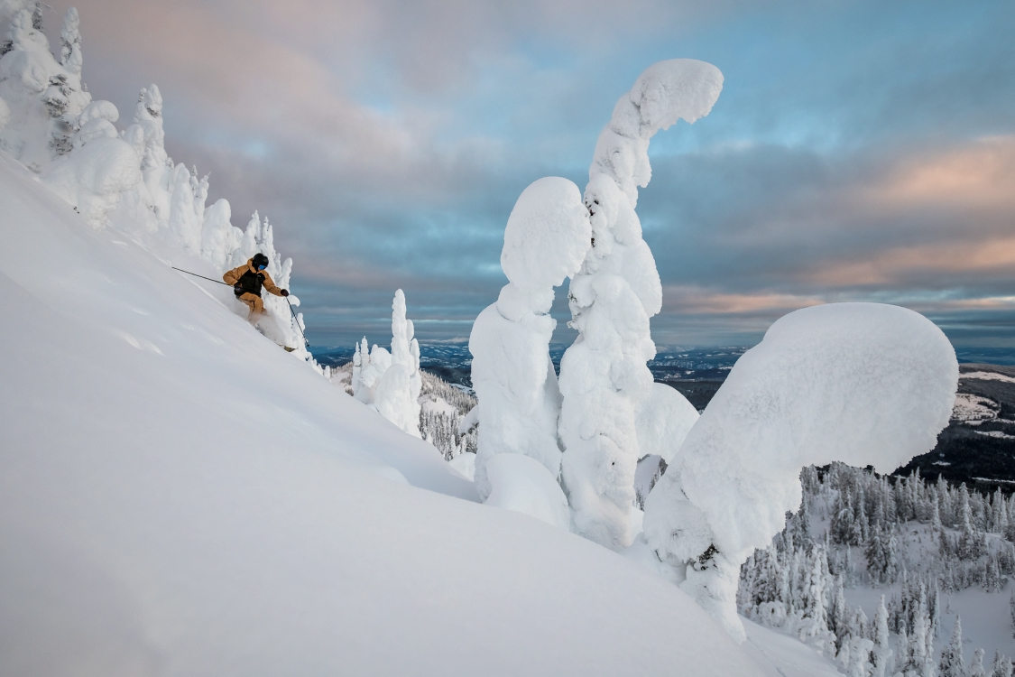 A person skiing down a mountain