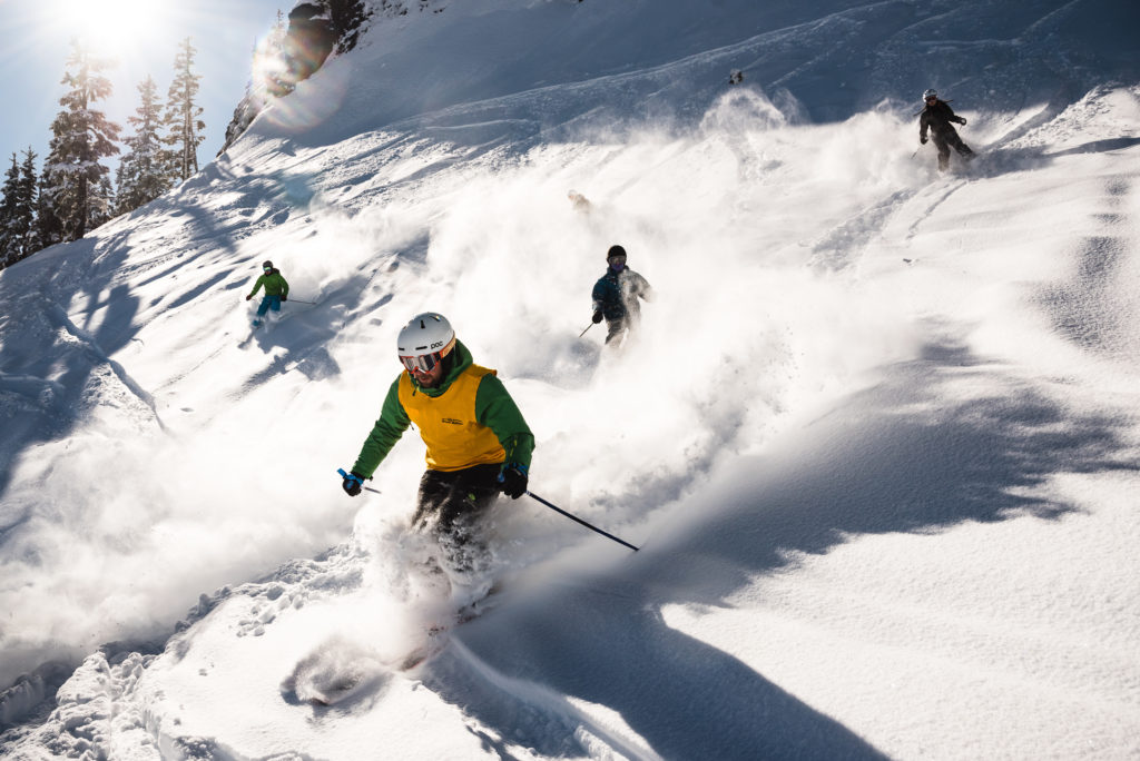 People skiing down a mountain