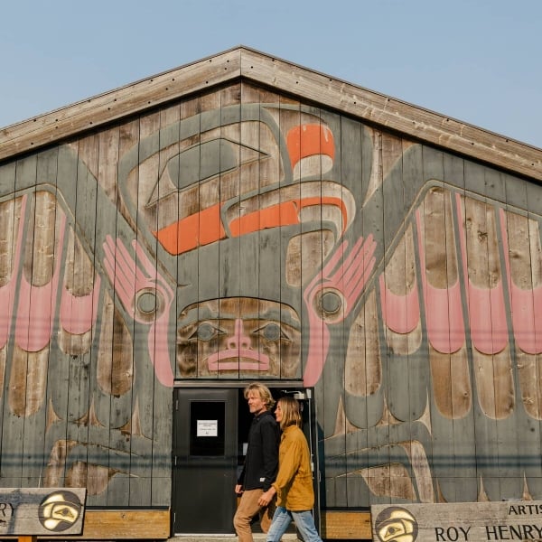 Two people visiting the Roy Henry Vickers Gallery