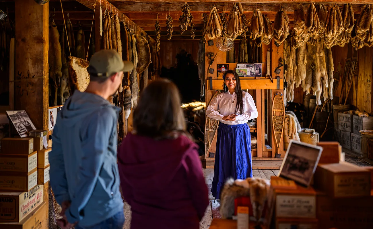 People in a building with historic objects