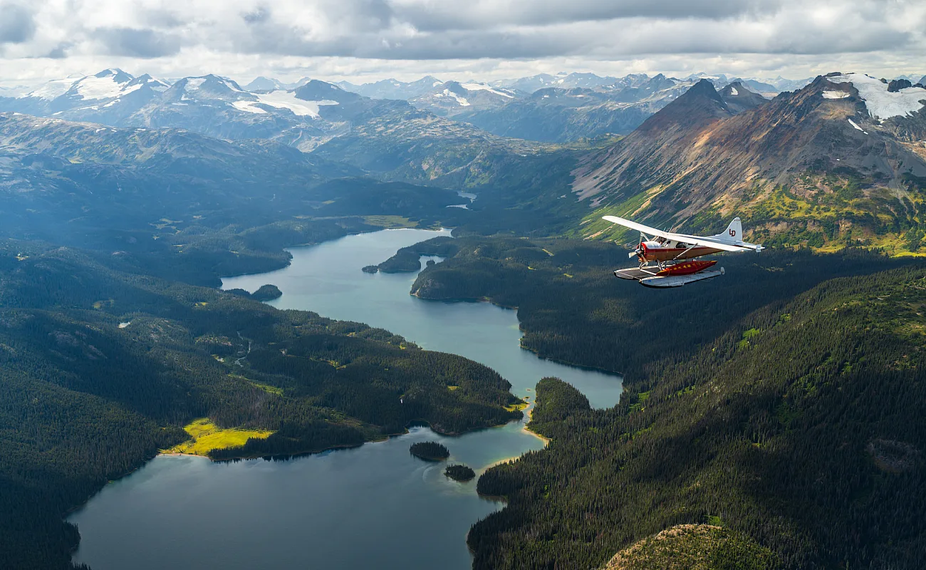 A plane flying over a lake