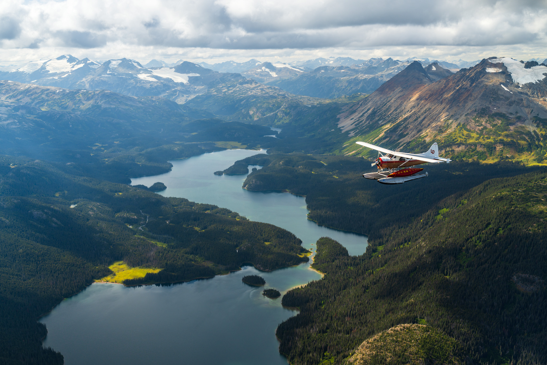 A plane flying over a lake