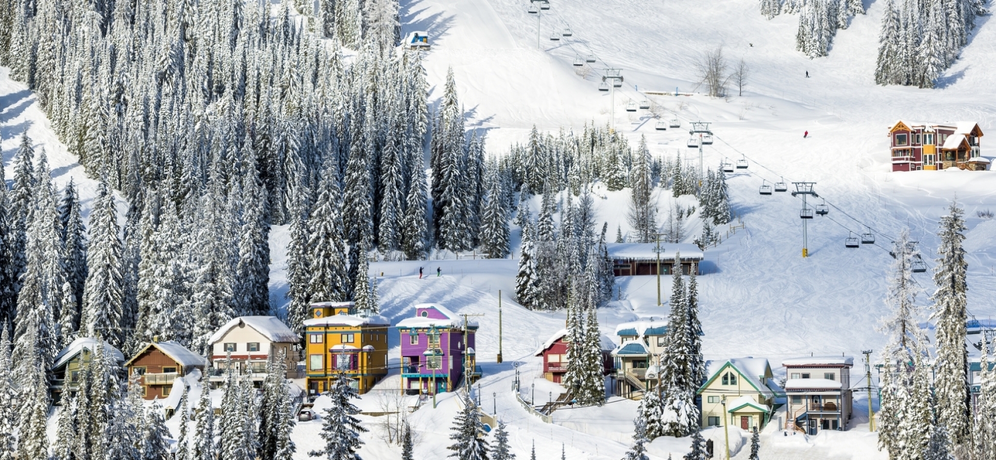 A view of a ski village at the base of a mountain in BC
