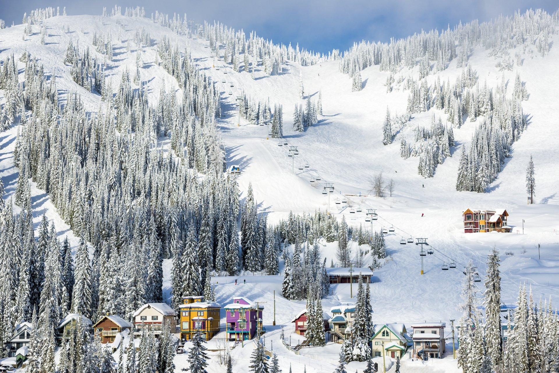 A view of a ski village at the base of a mountain in BC