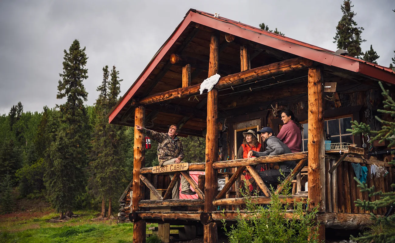 Group of people standing in a cabin