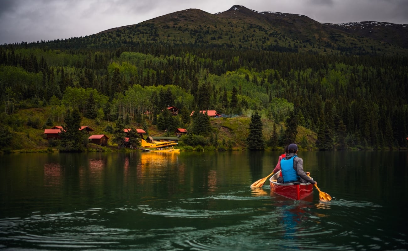 Person canoeing on a lake