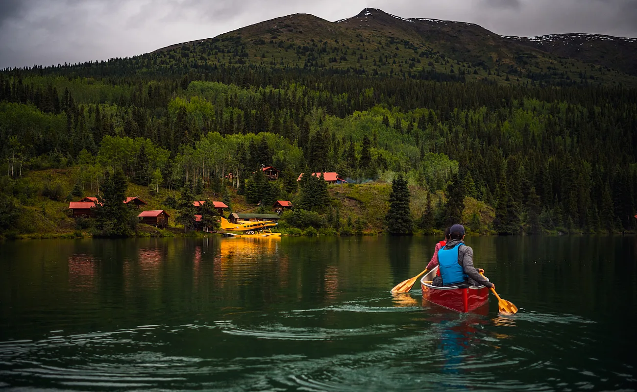 Person canoeing on a lake
