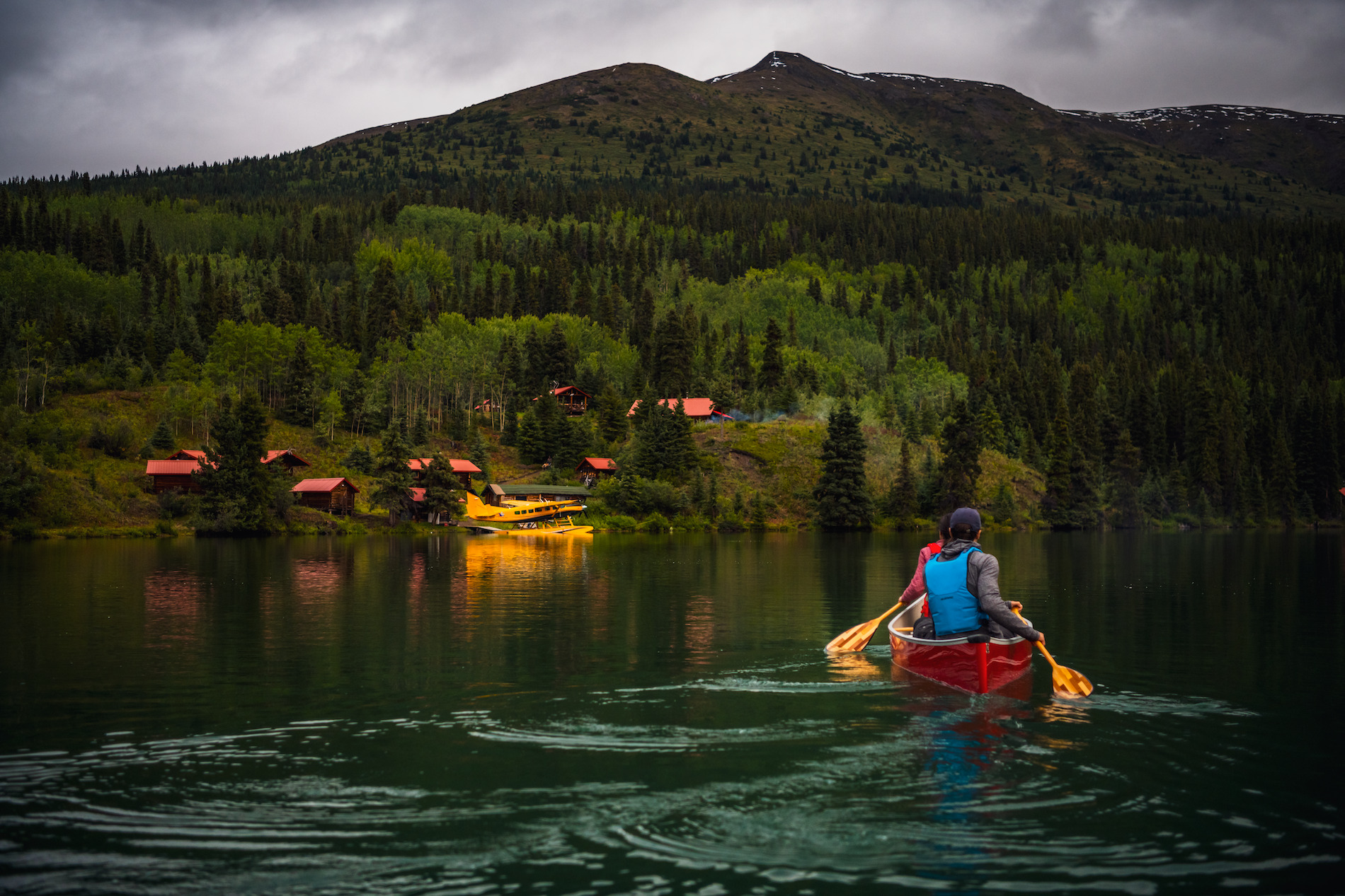 Person canoeing on a lake