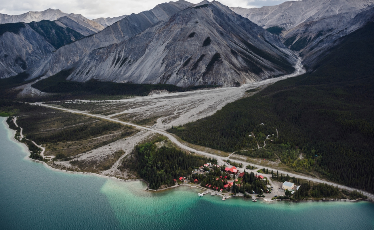 Road running beside a mountain