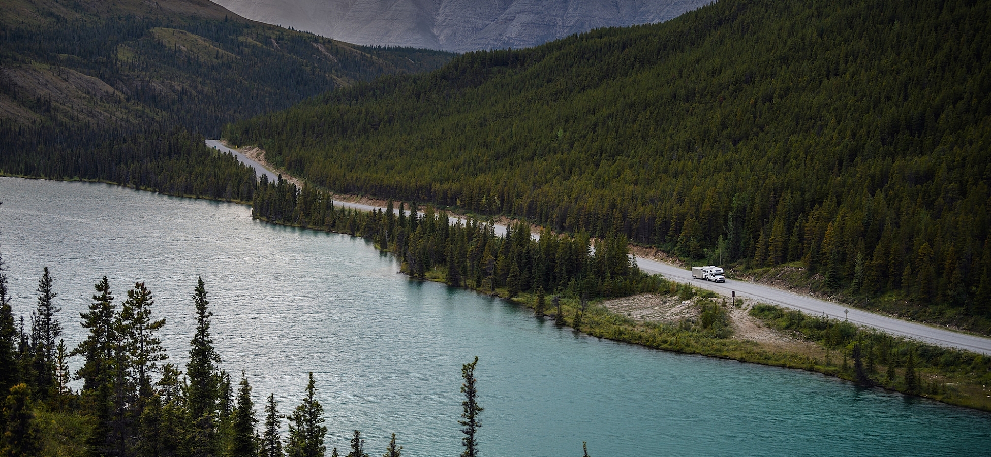 The Alaska Highway along Summit Lake in Stone Mountain Provincial Park | Northern BC Tourism/Andrew Strain