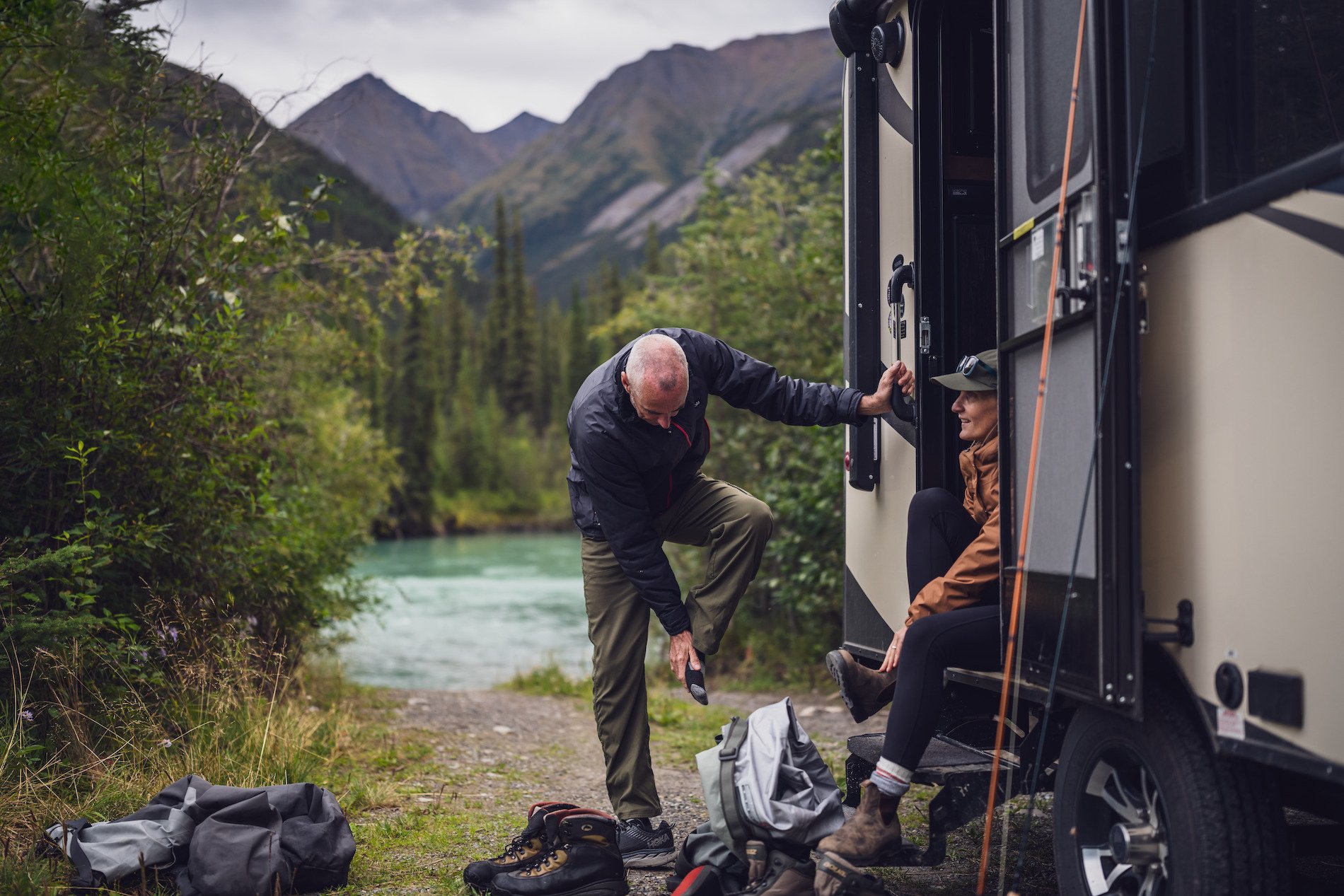 A man adjusting his shoe
