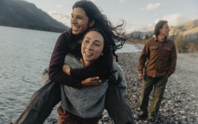 Three friends spending quality time together at Northern Rockies Lodge on Muncho Lake in Northern BC.