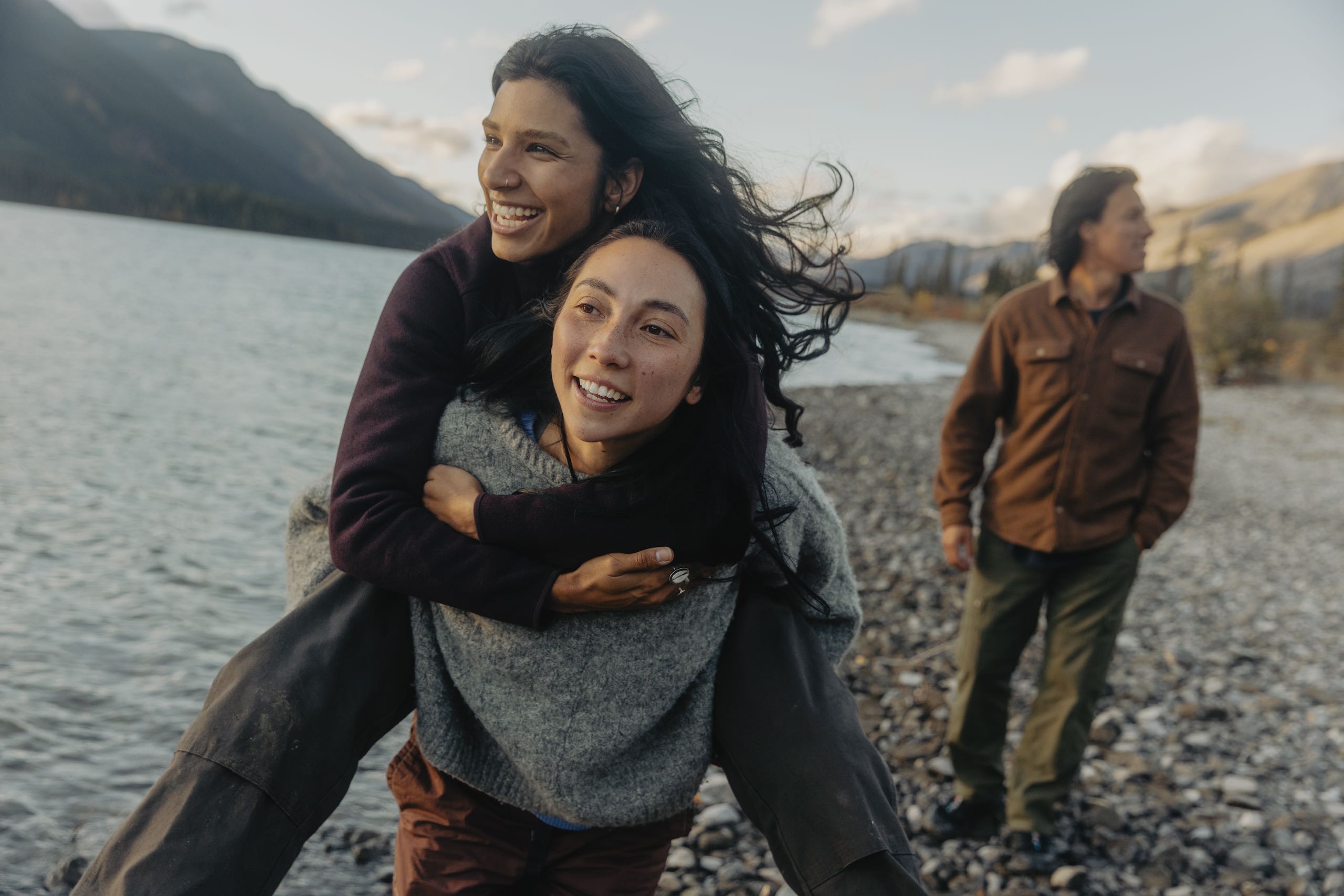 Three friends spending quality time together at Northern Rockies Lodge on Muncho Lake in Northern BC.