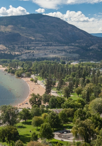 The beach and shoreline of Penticton on Skaha Lake.