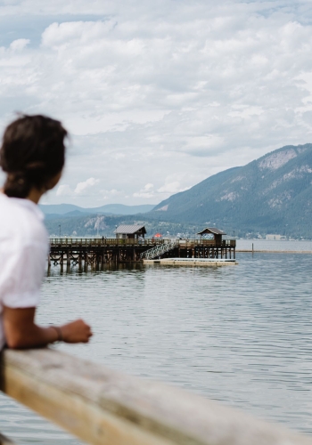 A woman standing on Salmon Arm Wharf