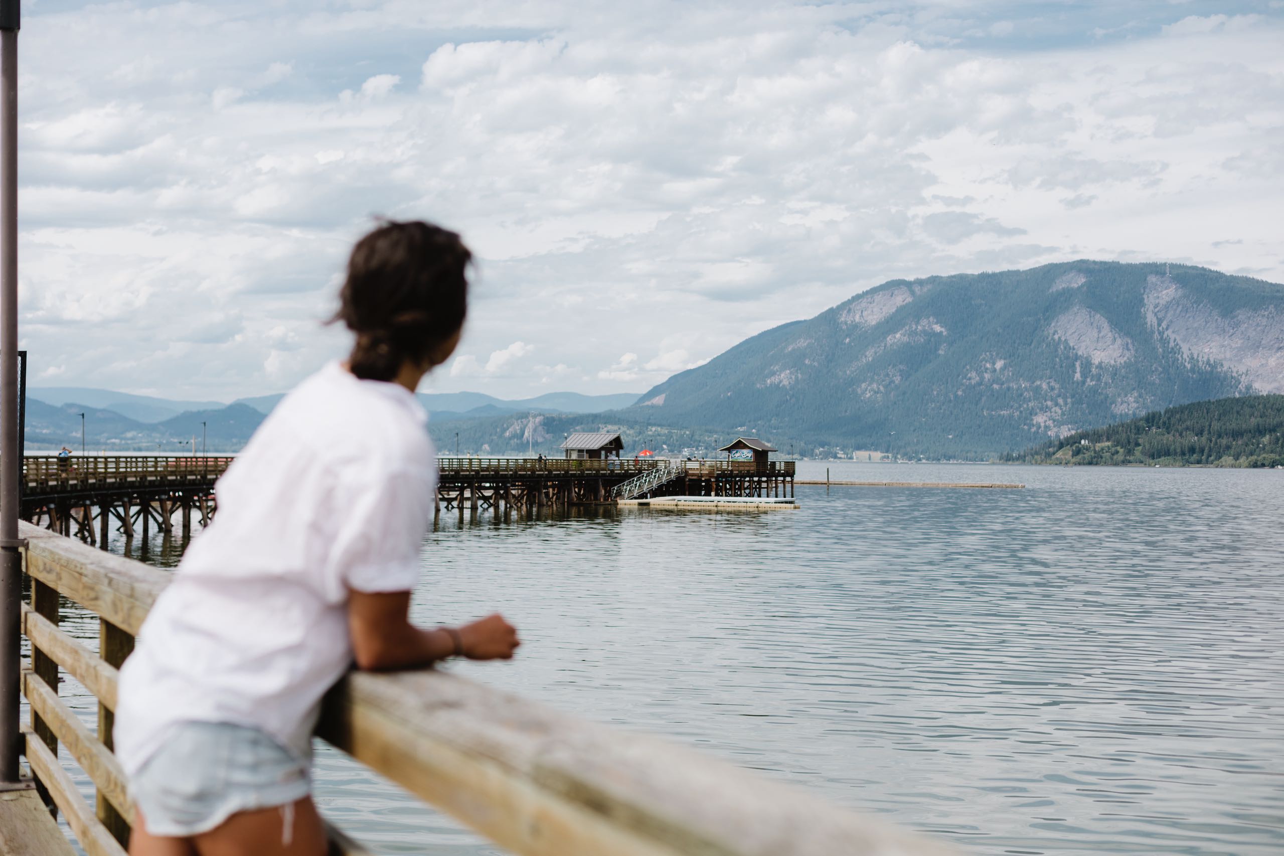 A woman standing on Salmon Arm Wharf