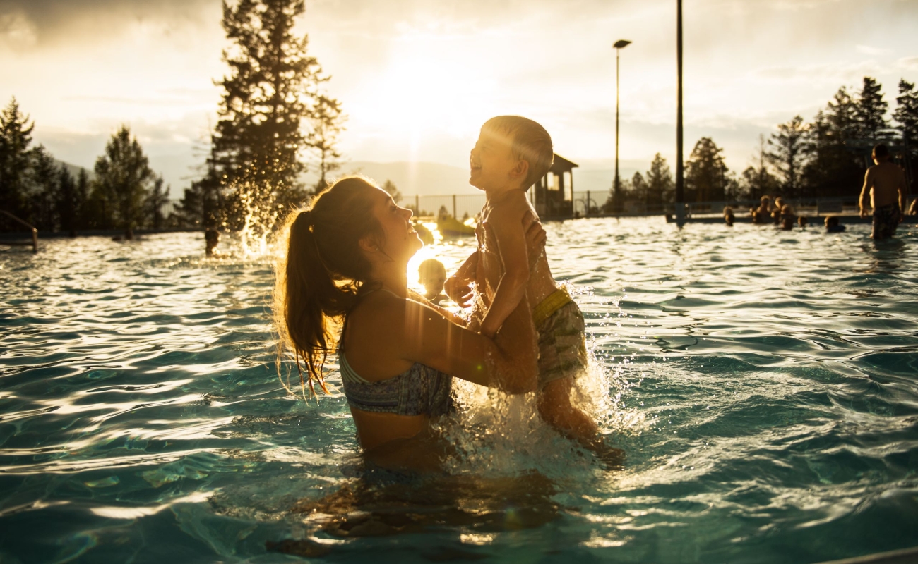 A mother and son enjoy the hot pools at Fairmont Hot Springs Resort in Fairmont Hot Springs, BC.