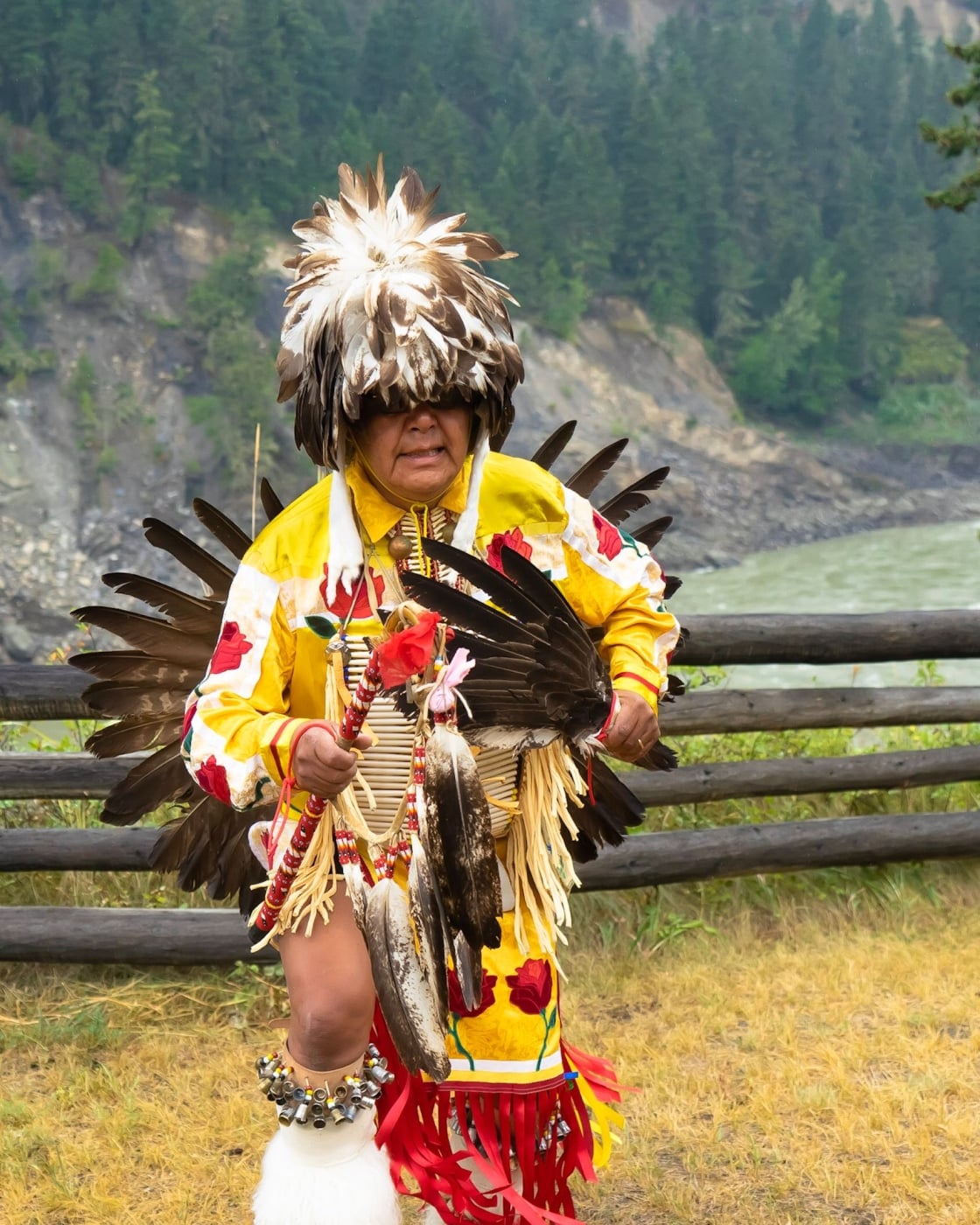 Dancing in regalia at Xatsull Heritage Village in Soda Creek