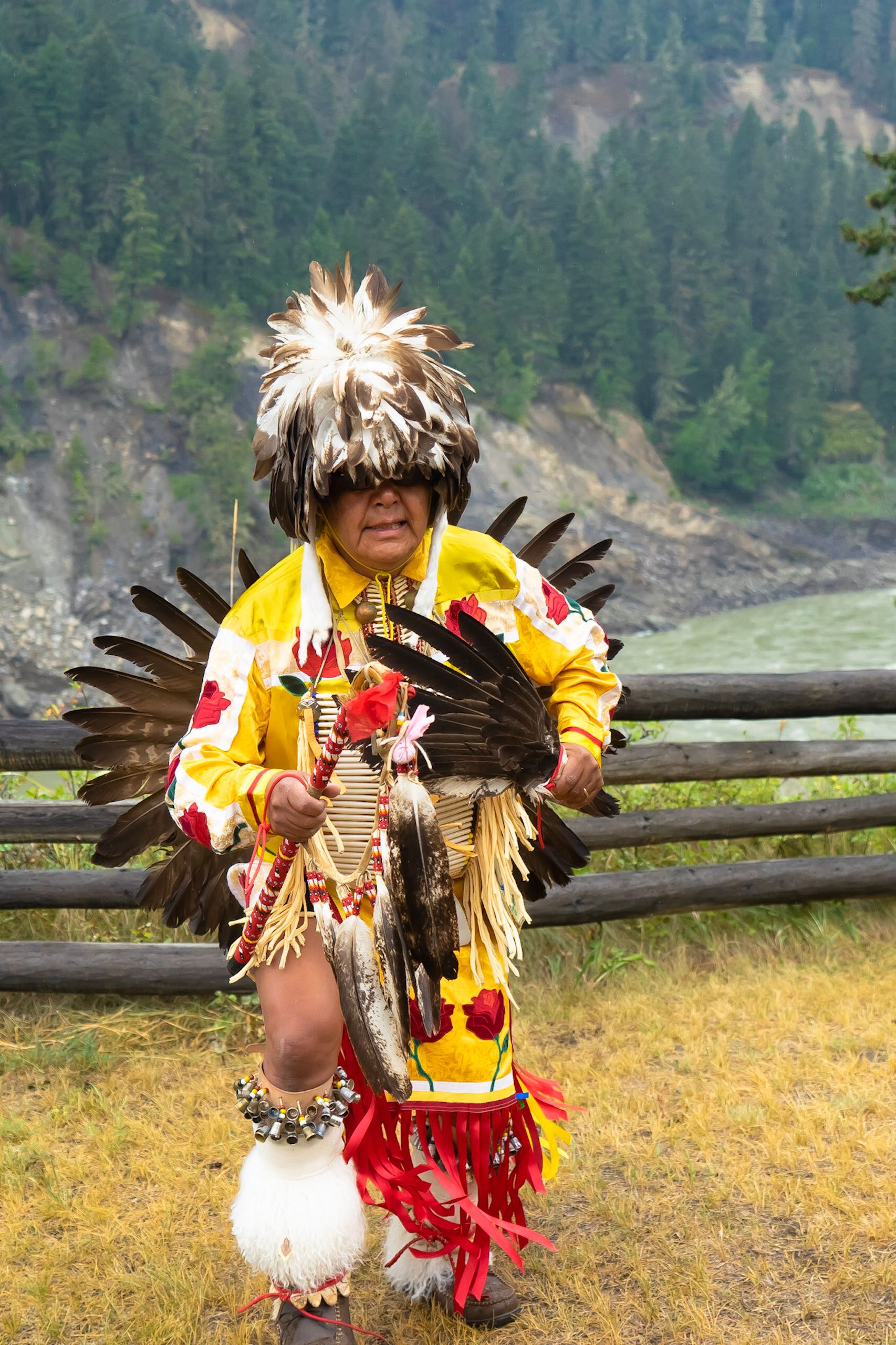 Dancing in regalia at Xatsull Heritage Village in Soda Creek