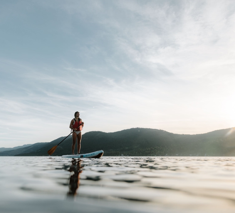 Stand-up Paddleboarding on Little Shuswap Lake, in front of Quaaout Lodge & Spa