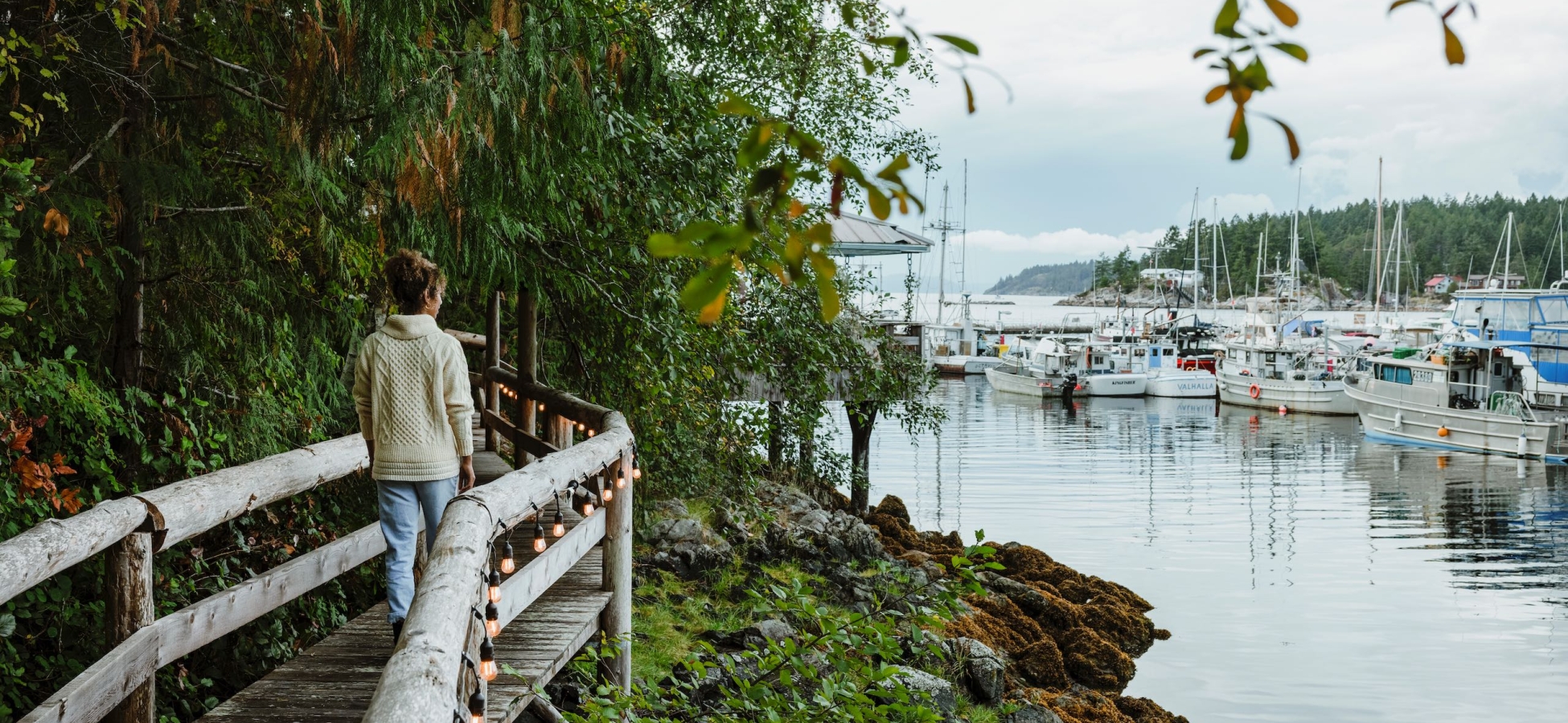 Enjoying a walk along the Lund harbour boardwalk between The Boardwalk Restaurant and Lund Harbour House