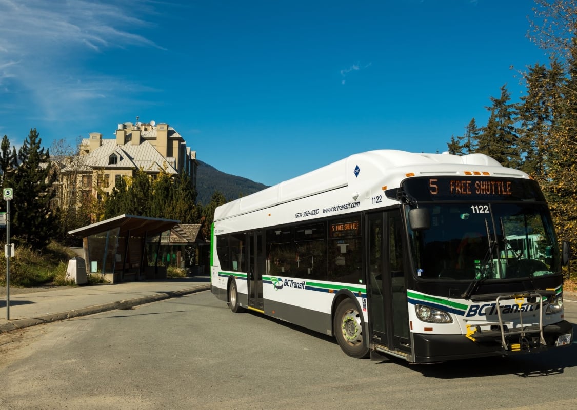 A free shuttle leaving its stop