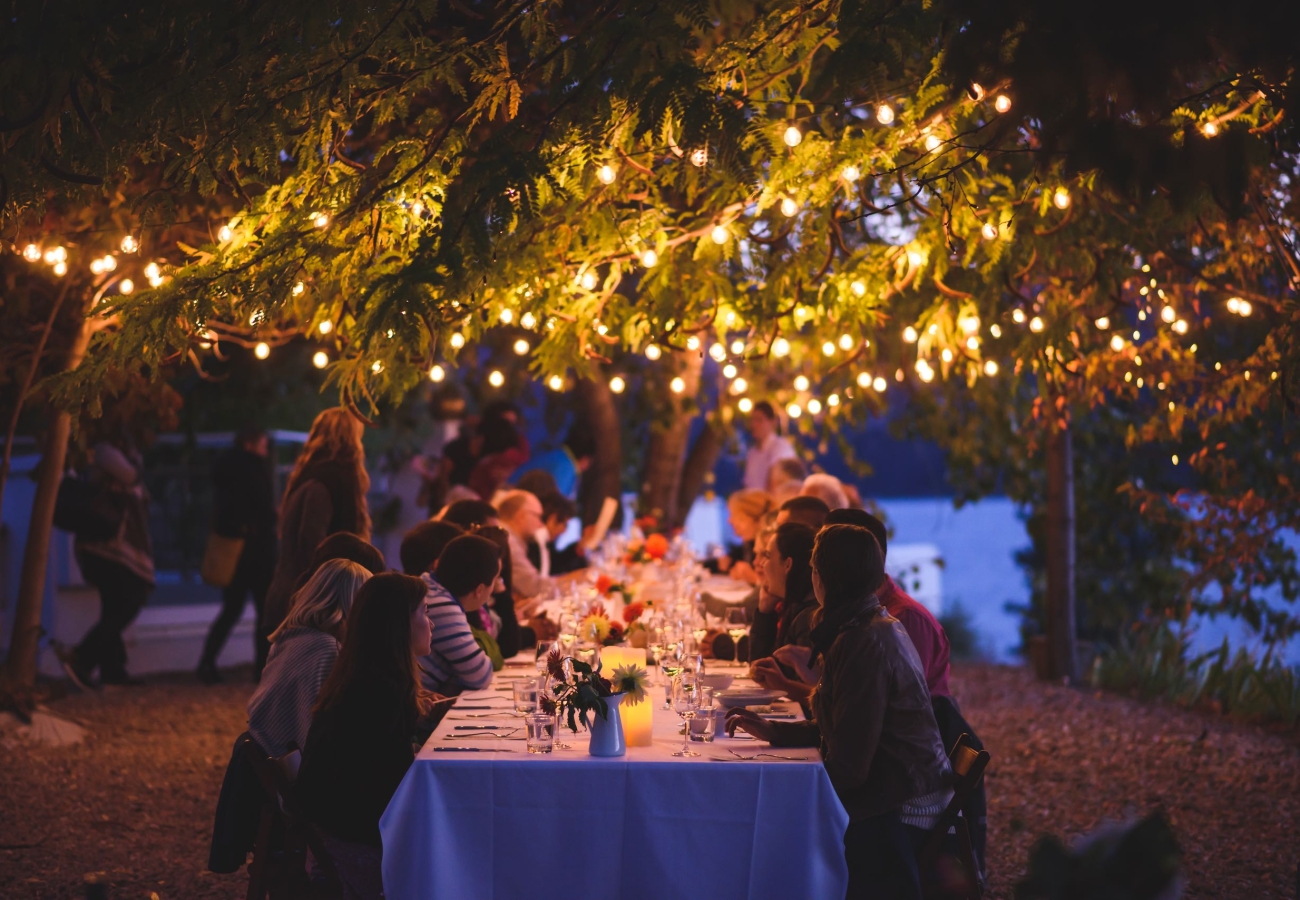 Friends dining at God's Mountain Estate