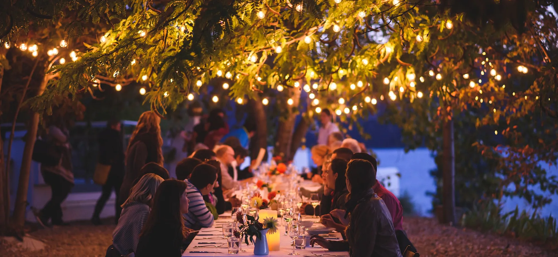Friends dining at God's Mountain Estate
