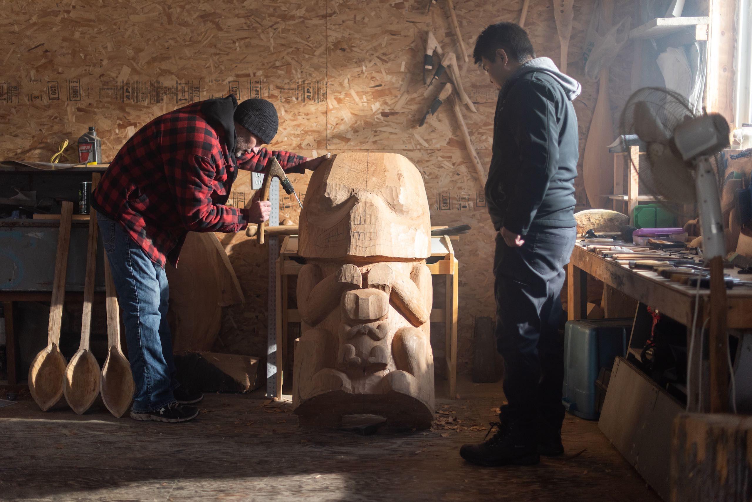 Carvers Gerald Robinson and Calvin McNeil in the Laxgalts'ap Carving Shed.