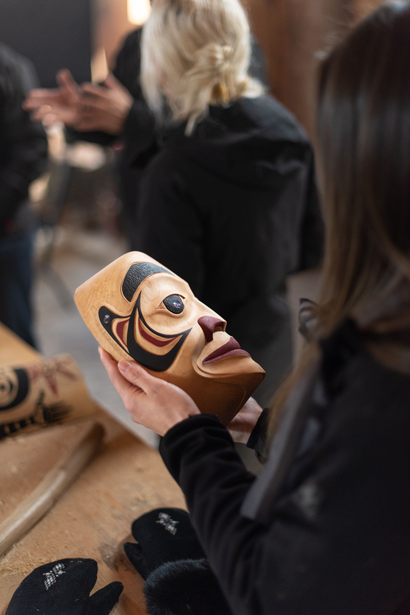 Learning about history and culture of the Nisga'a with carver Calvin McNeil in the Laxgalts'ap Carving Shed.