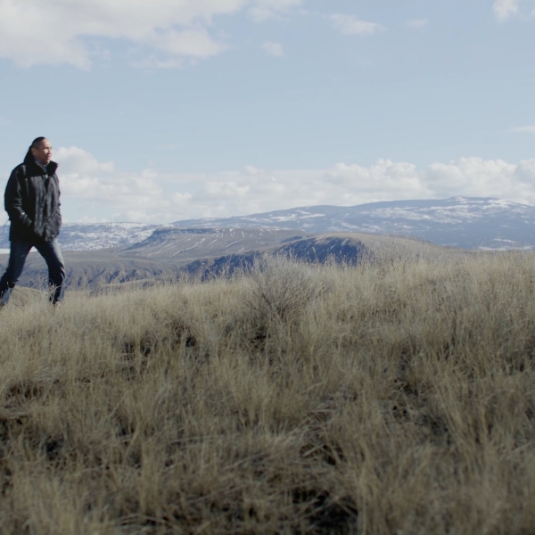 A man walking on a mountain in BC