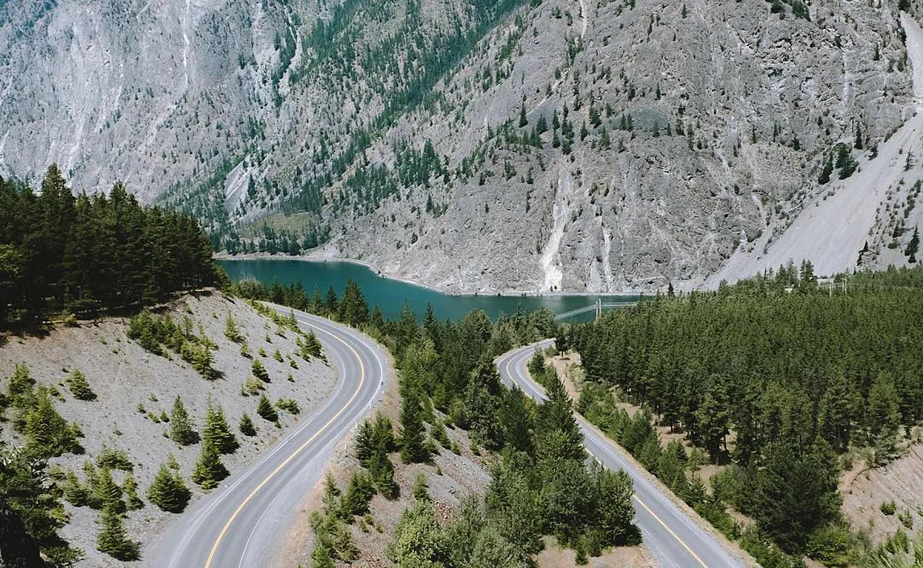 aerial view of a road by a river in Lillooet