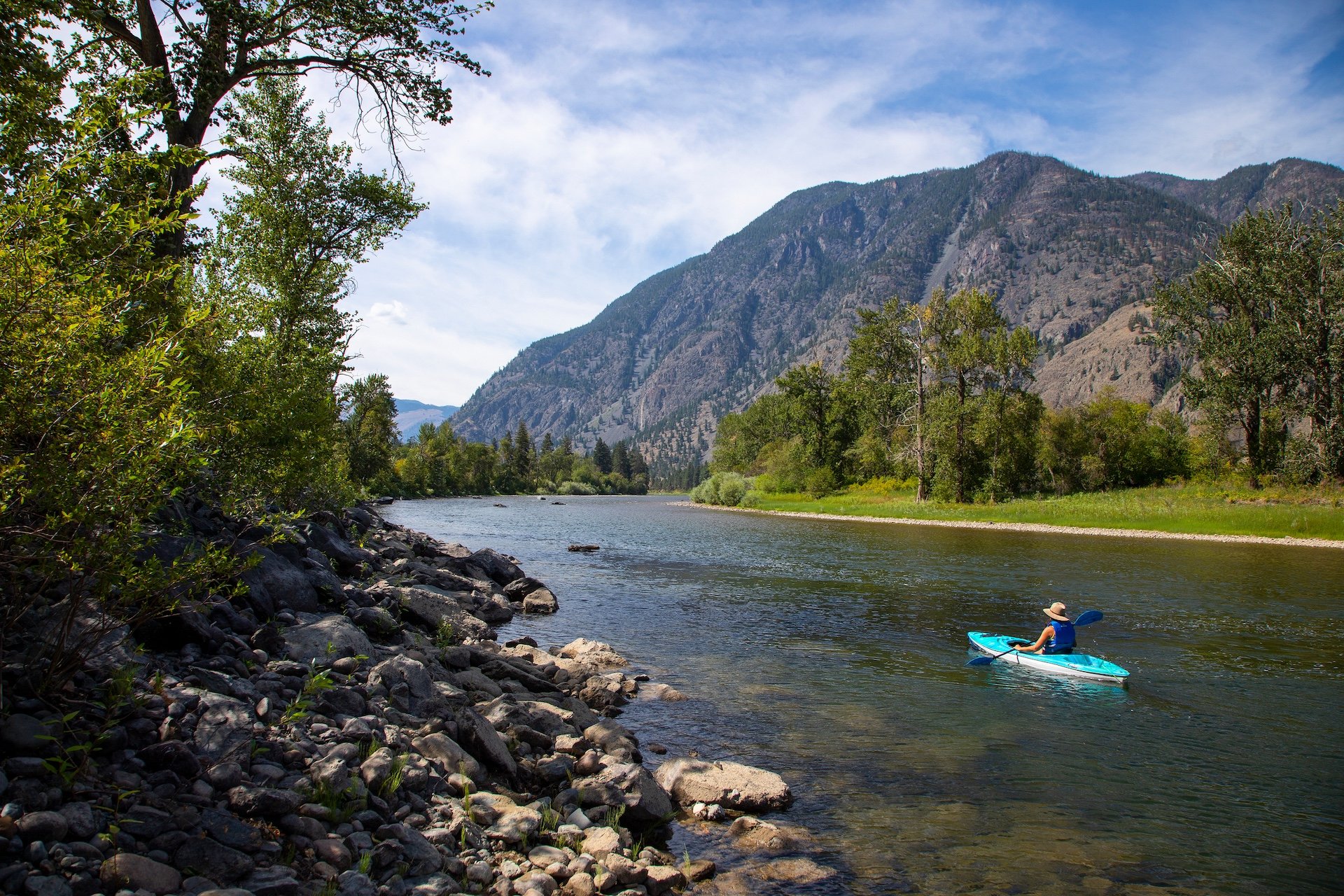 Person kayaking on the Similkameen River, west of Keremeos