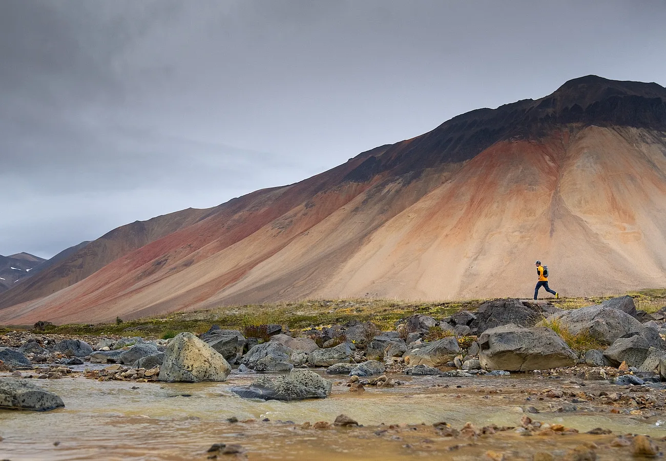 Hikers / trail runners in the Spectrum Range, Mount Edziza Provincial Park.