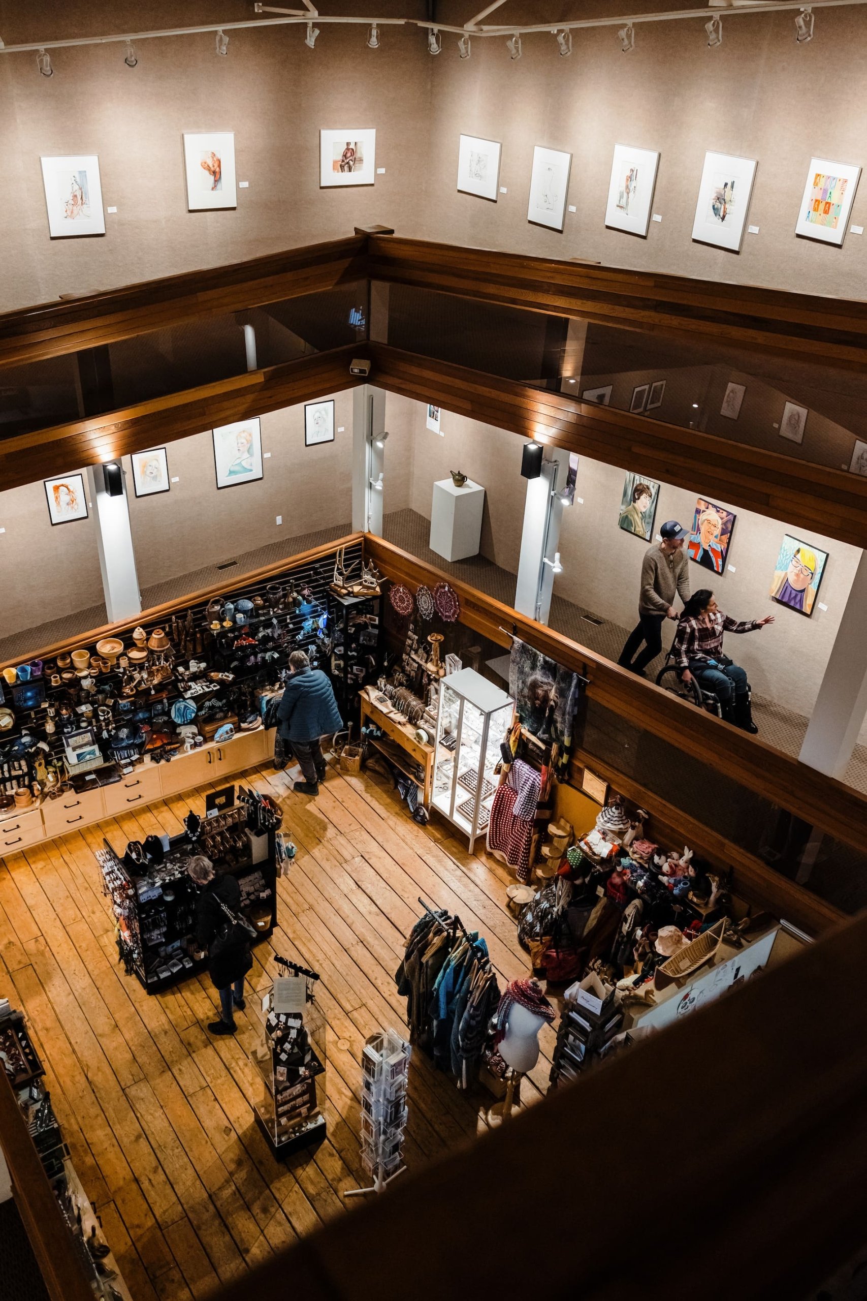Several people in an art gallery