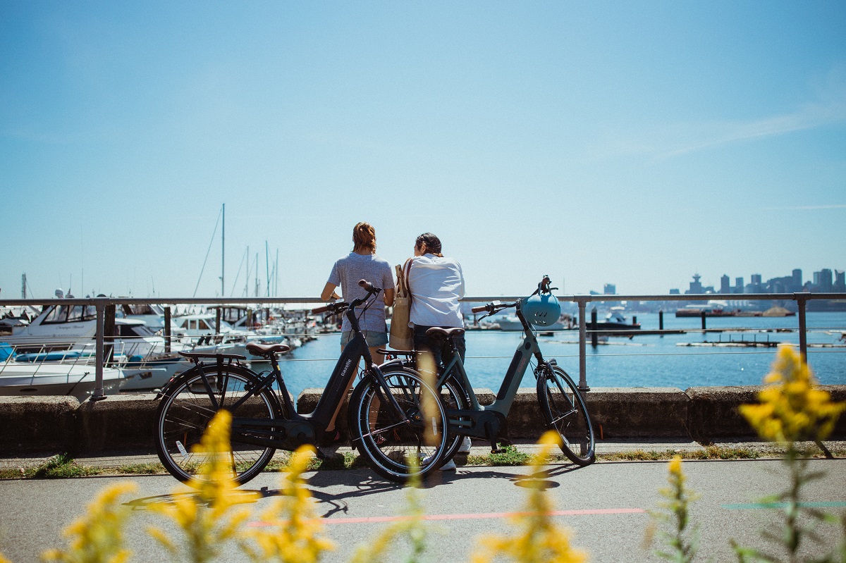 Two people looking out at the harbour in North Vancouver