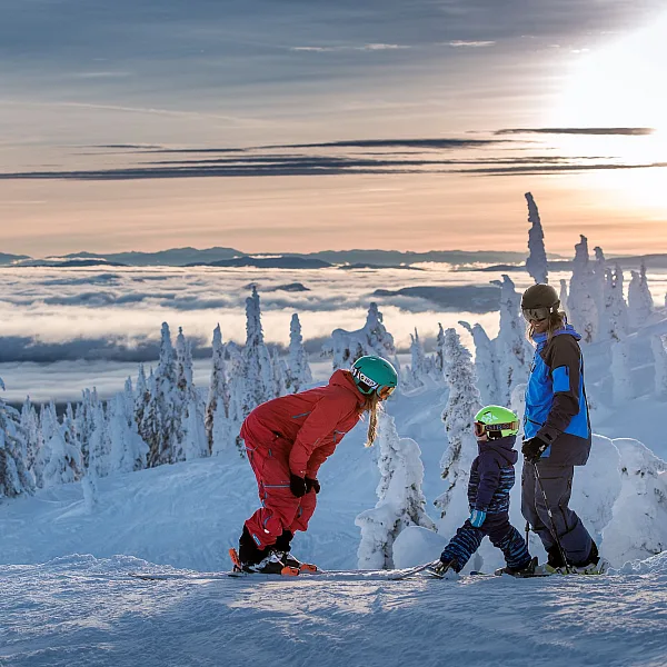 A group downhill skiing at Big White Ski Resort