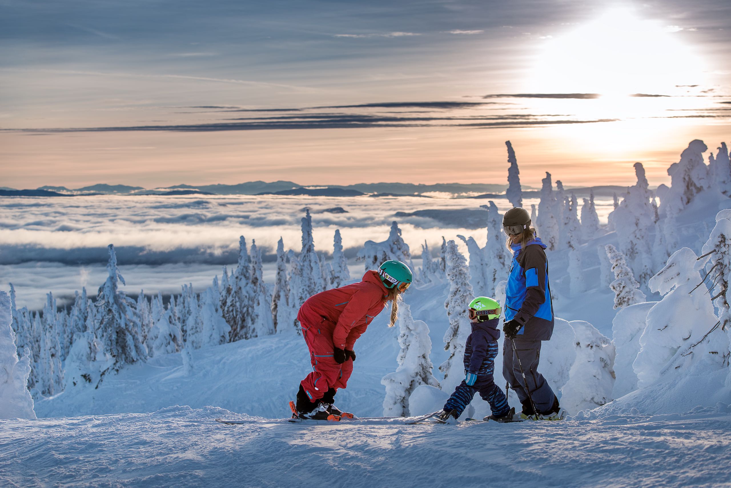 A group downhill skiing at Big White Ski Resort