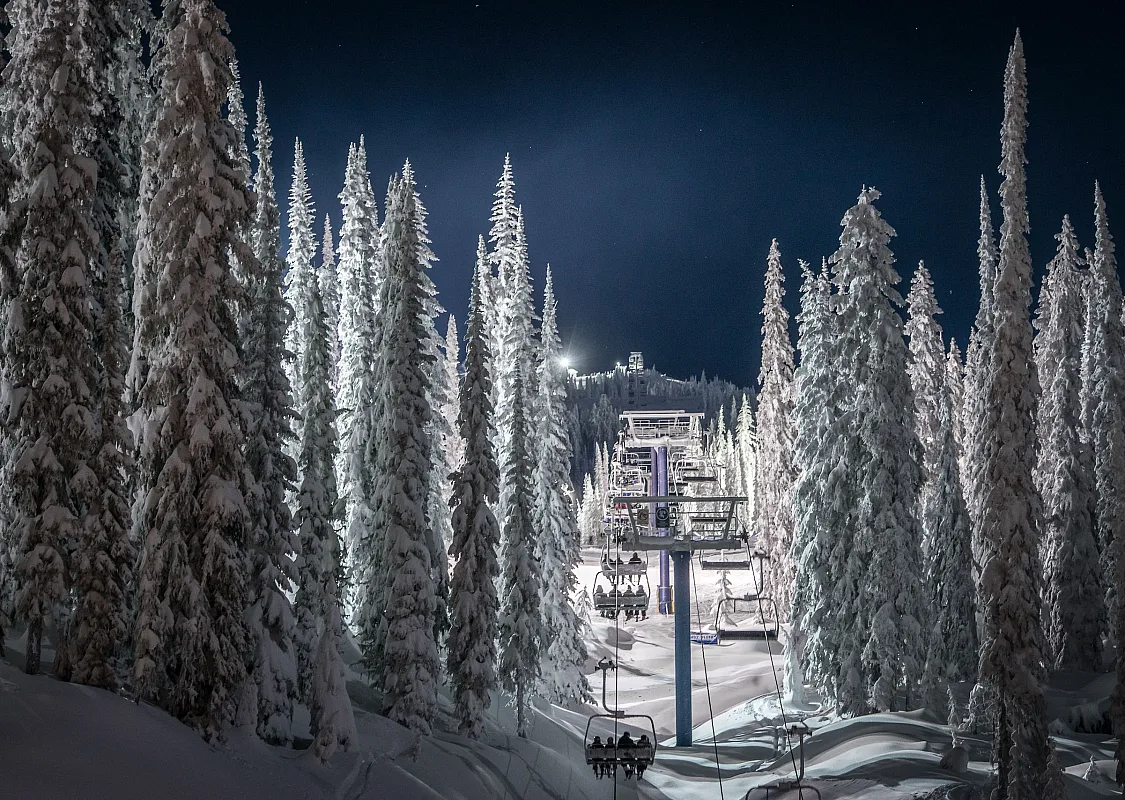 Night skiing and the chairlift at Big White Ski Resort