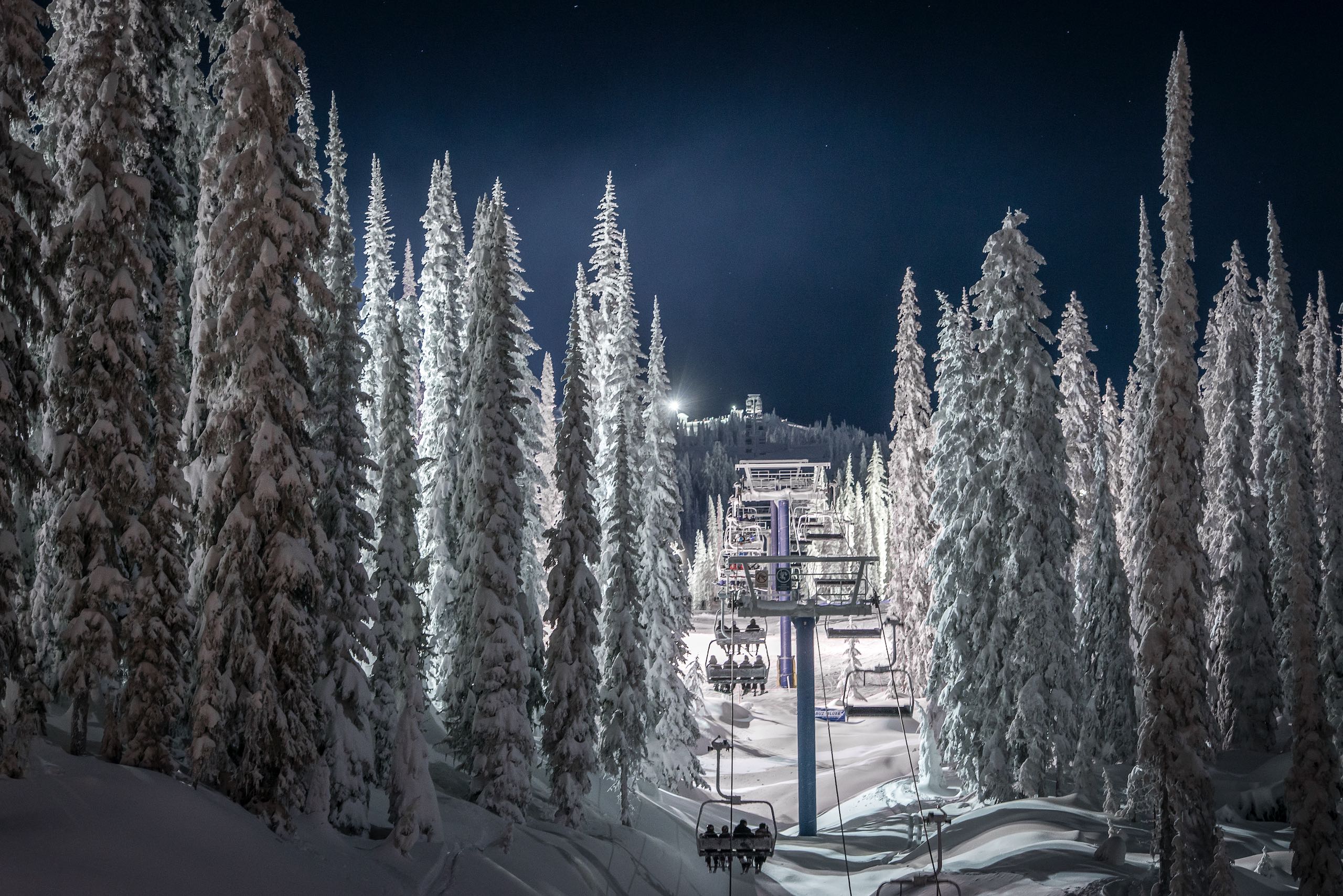 Night skiing and the chairlift at Big White Ski Resort