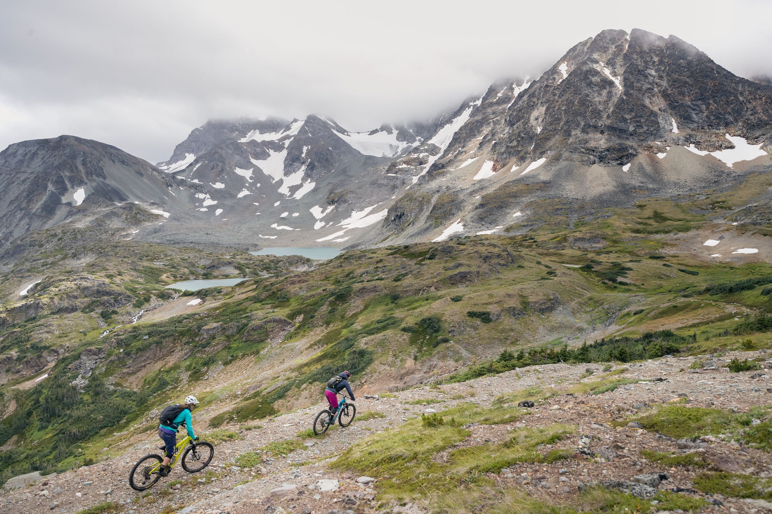 Brittany Phelan (left) & Sarah Leishman (right), mountain bikers, in Cronin Pass, BC