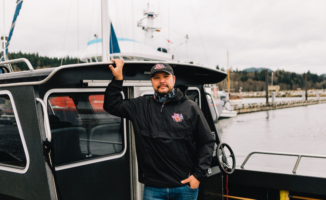 Sea Wolf Adventures’ owner Mike Willie on a boat